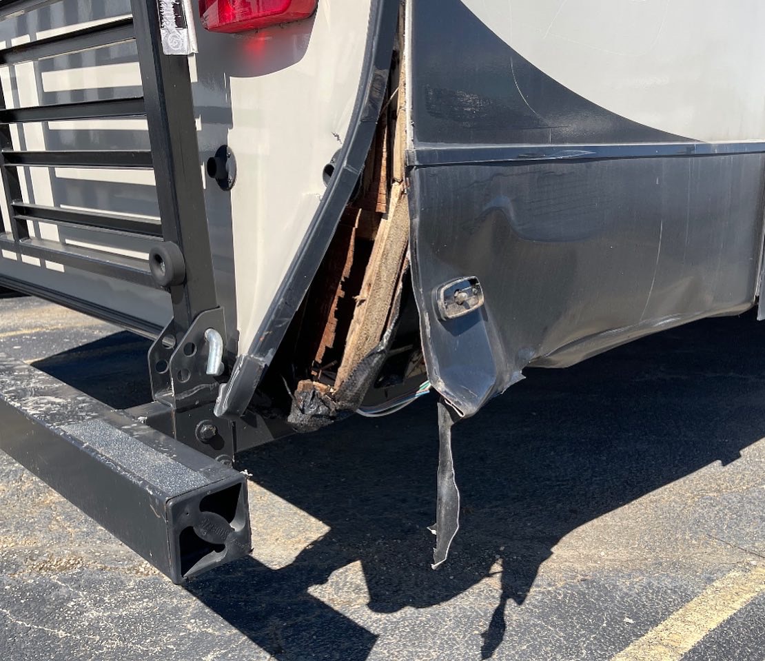 rv with corner damage from collision