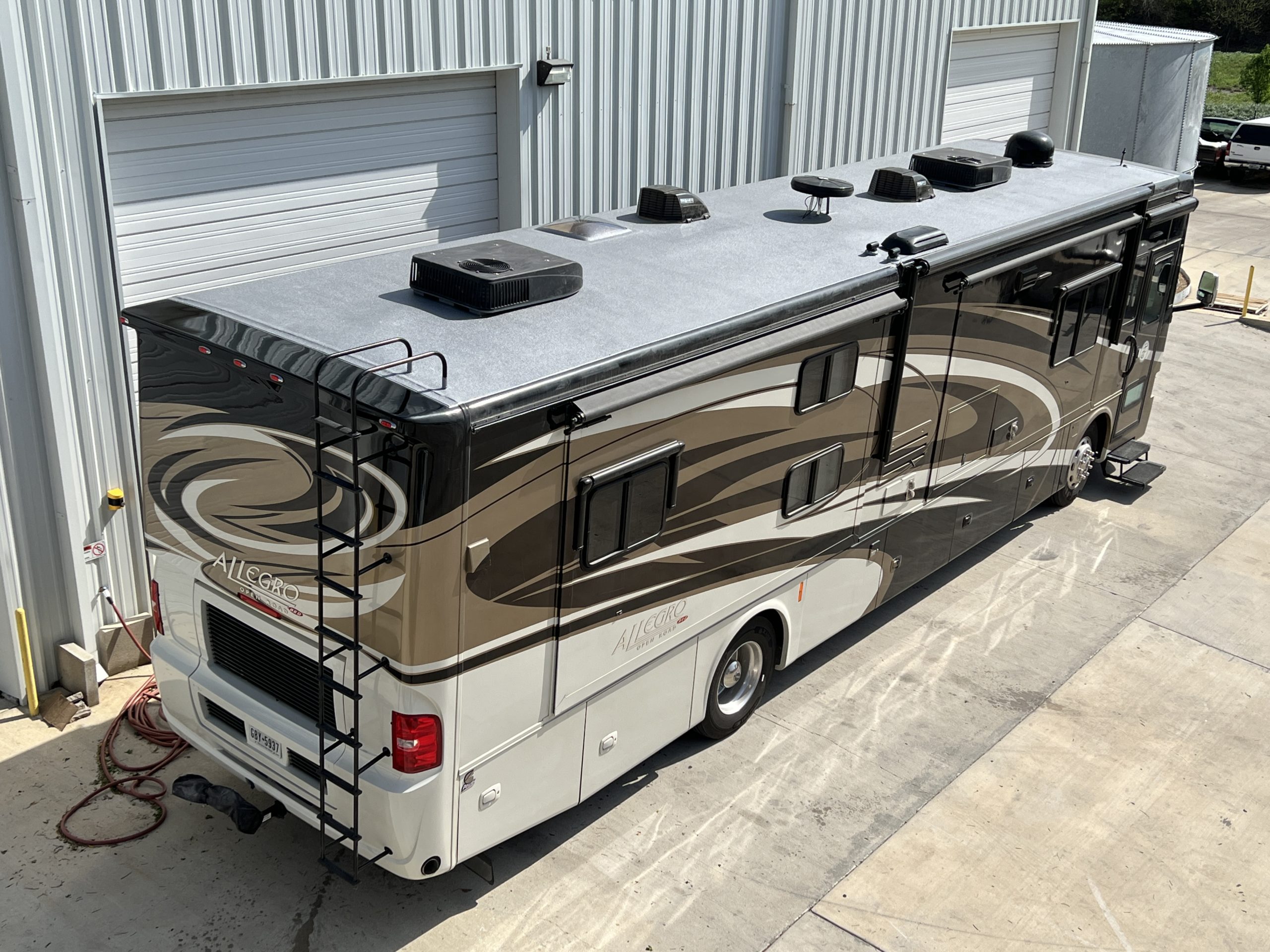 rv motorcoach with new rv roof liner from elite rv