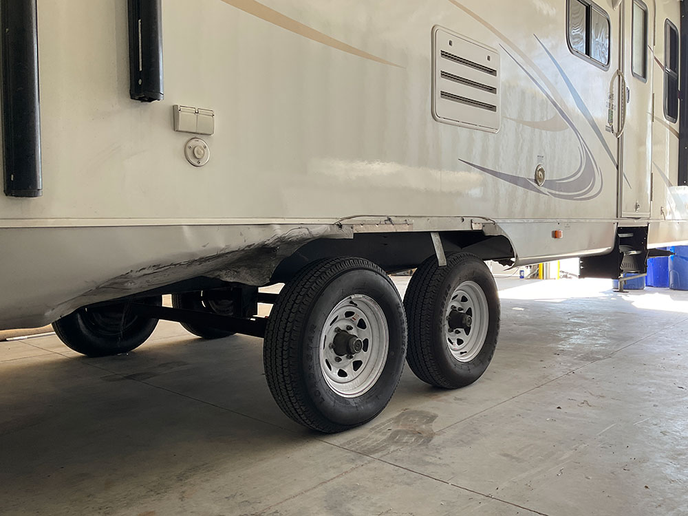 rv travel trailer tire blowout damage