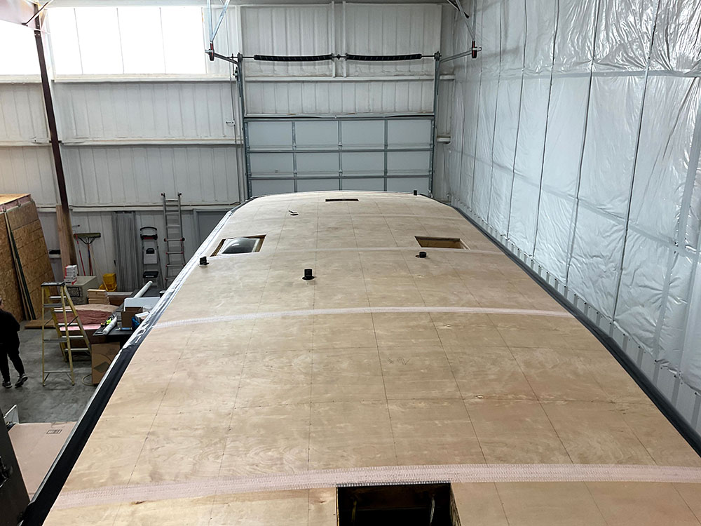 rv fifth wheel undergoing roof replacement at elite rv repair shop