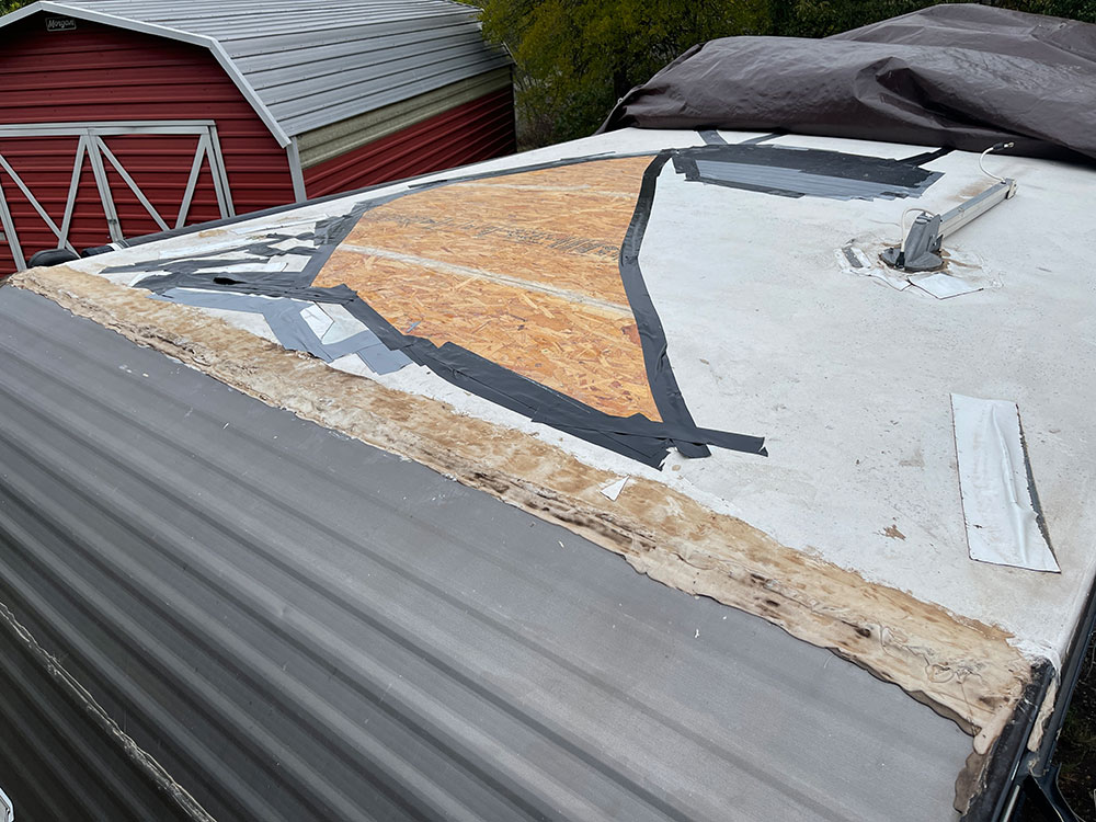rv travel trailer with roof damage