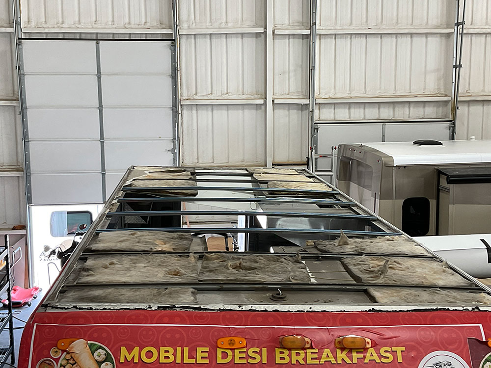 food truck with extreme roof damage