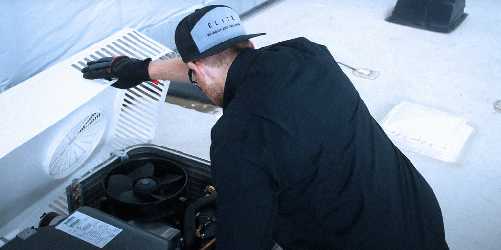 elite rv technician replacing an rv air conditioner